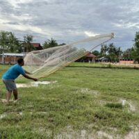 Learn how to throw a Cambodian fishing net