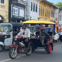 Two ways to get around in Siem Reap: By tuk tuk or by rickshaw