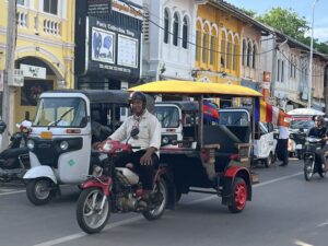 Two ways to get around in Siem Reap: By tuk tuk or by rickshaw
